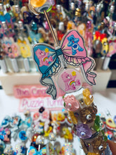 Load image into Gallery viewer, Acrylic Pen Spinners: Pink &amp; Blue Caring Bear Bow